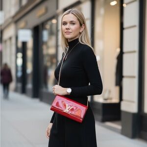 Louis Vuitton patent red leather clutch